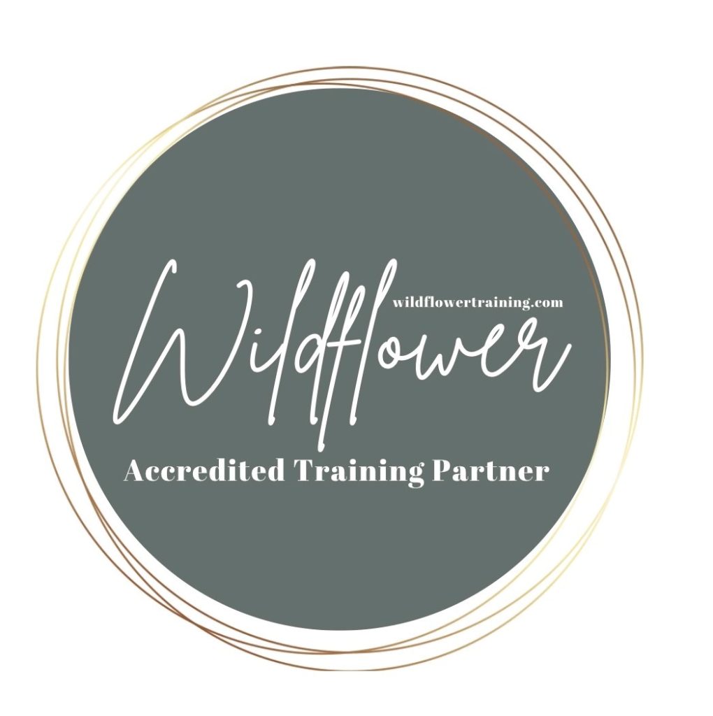 Wildflower Baby Massage Teacher Training Accredited Partner Logo white writing on a green circle